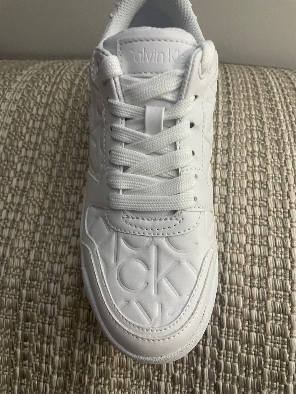 Calvin Klein All-White Embossed CK Lace-Up Sneaker